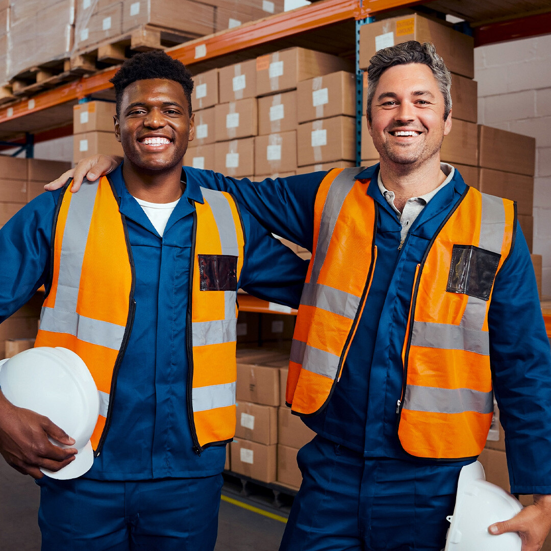 two-owner-of-logistic-company-inside-warehouse-smiling