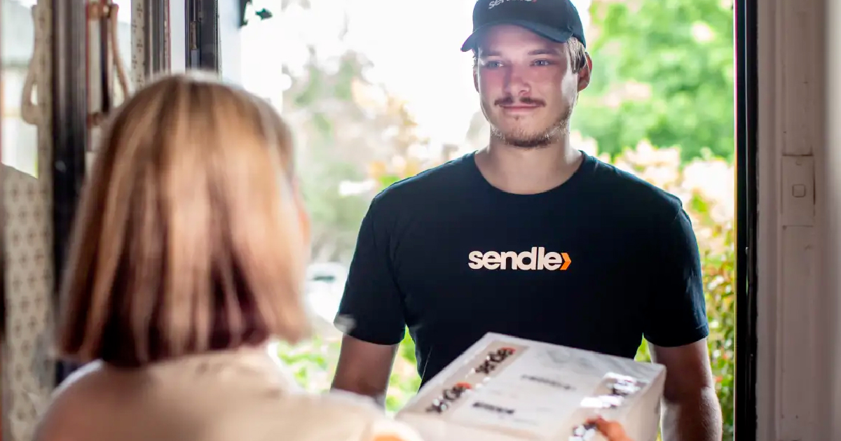 Sendle delivery guy picking up the parcel package